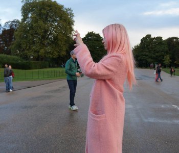 Lady taking pictures of the view